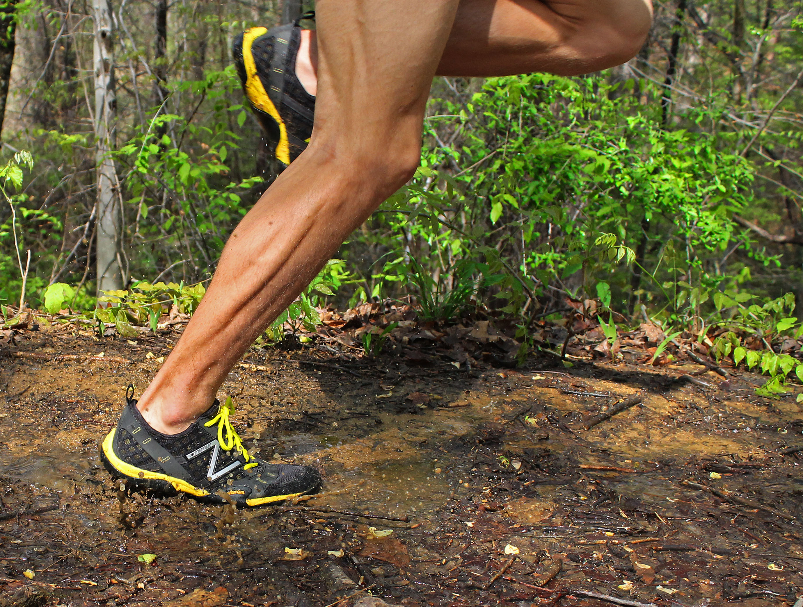 Close-up of a runner's stride on trail